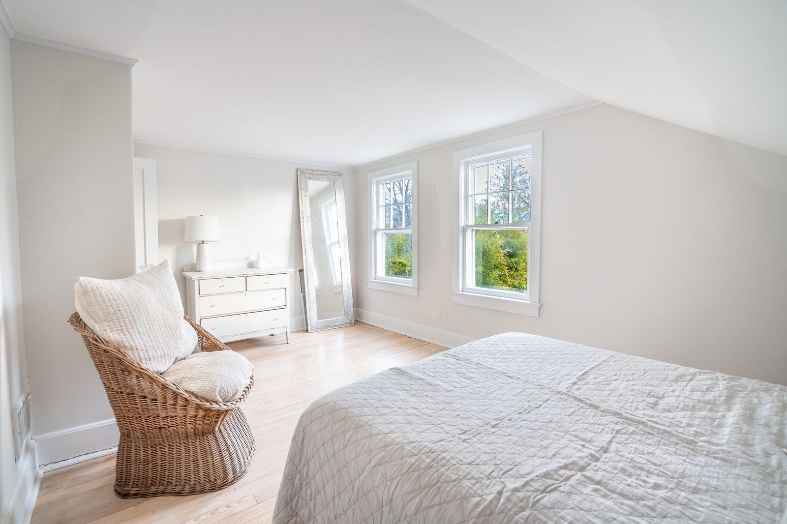 Upstairs bedroom under a sloped roof